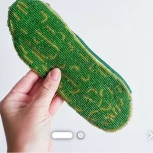 Green beaded pickle pouch with Zipper Closure, still wrapped, approx 9x3”